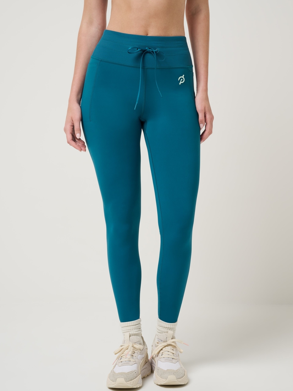 TravisMathew x Peloton Teal Ablaze Tie Legging